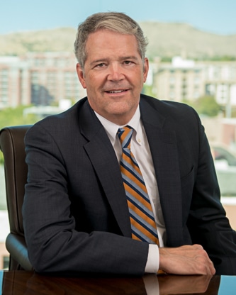 Seated photo of Steven J. Christiansen Attorney at Parr Brown Gee and Loveless